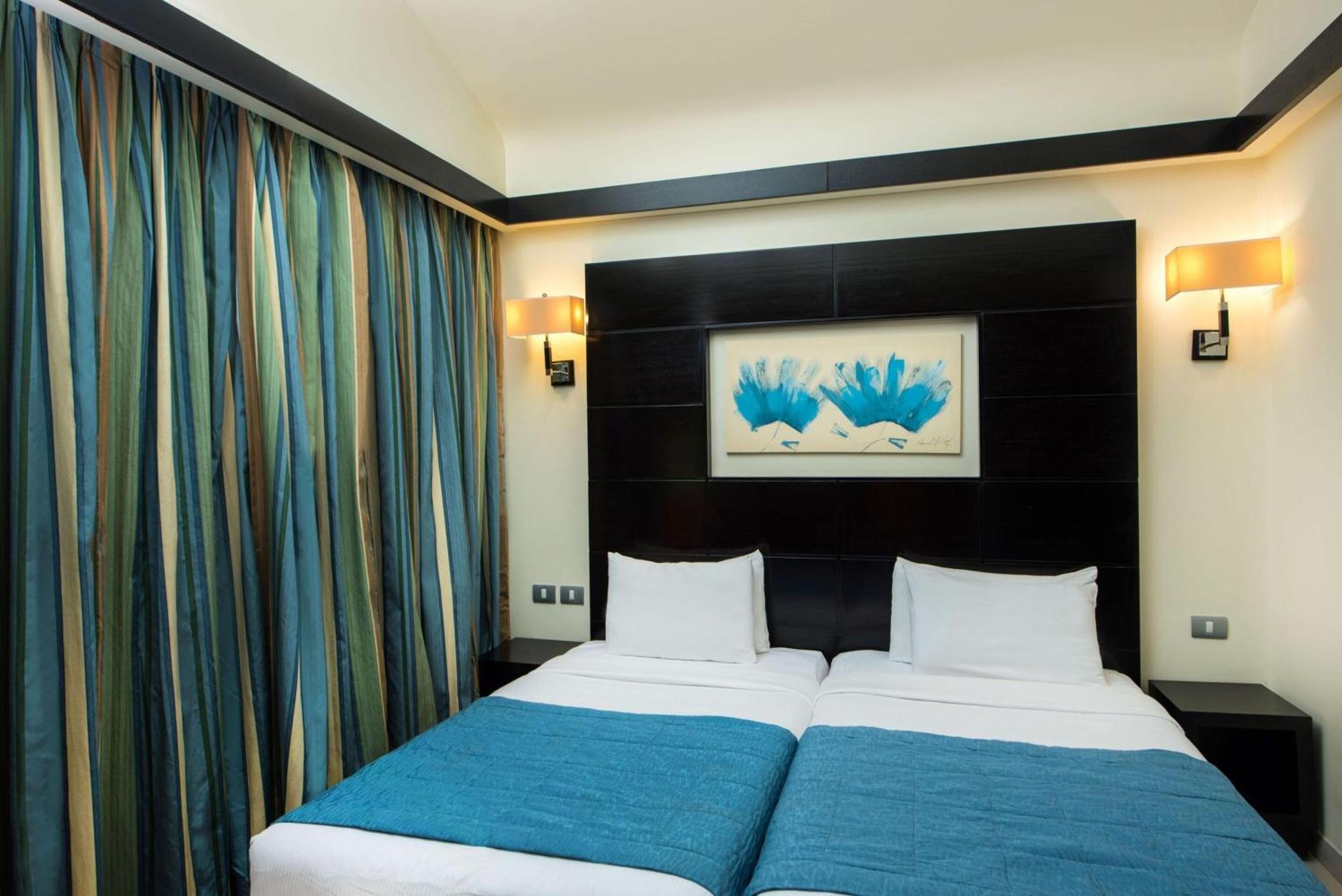 Reef Oasis Blue Bay Resort & Spa Sharm el Sheikh Esterno foto A bedroom at the hotel