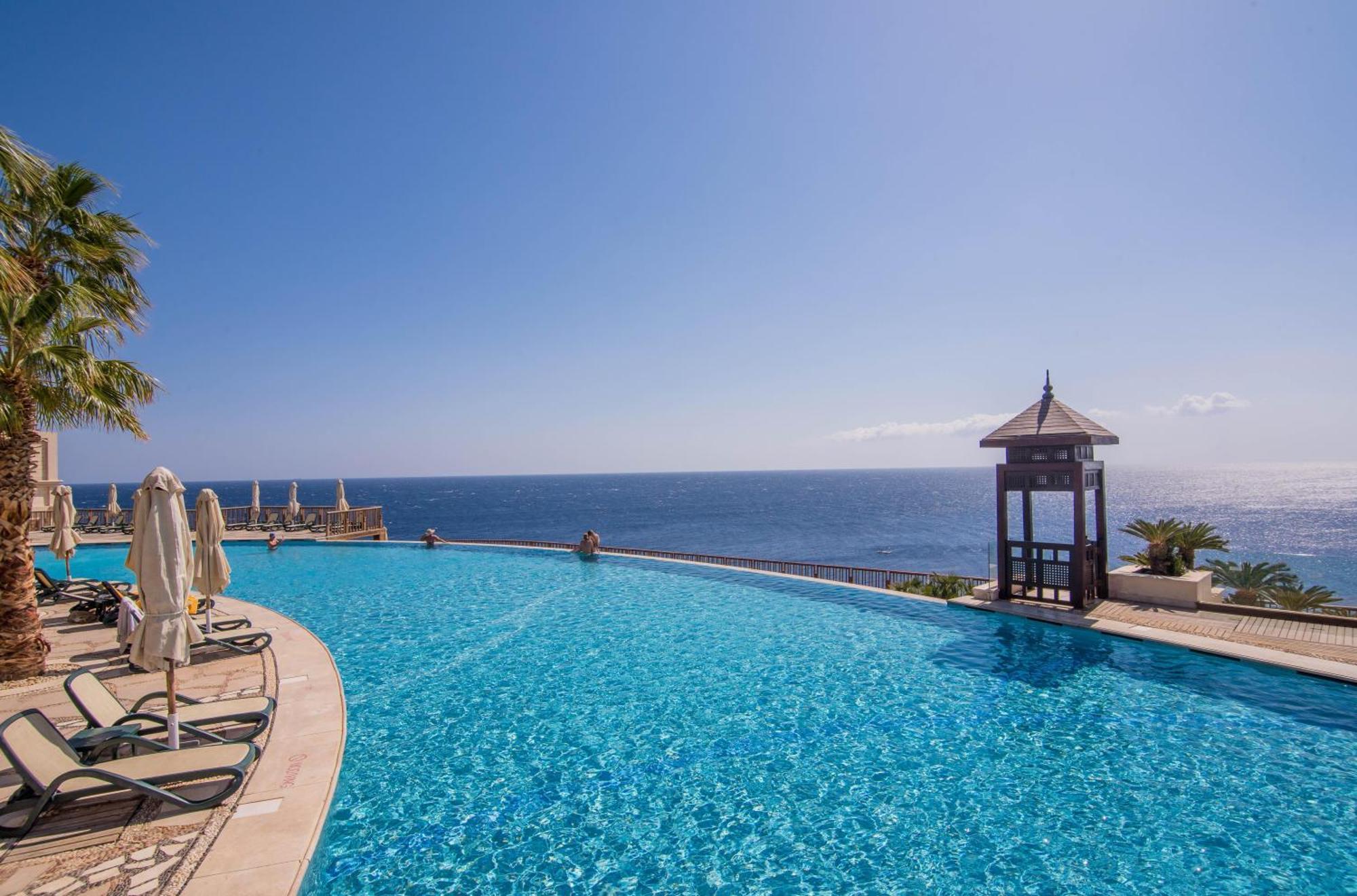 Reef Oasis Blue Bay Resort & Spa Sharm el Sheikh Esterno foto Infinity pool at the Grand Resort